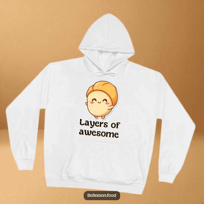 Funny hoodie with a happy croissant character unfurling its flaky layers, perfect for cozy comfort and a funny gift.