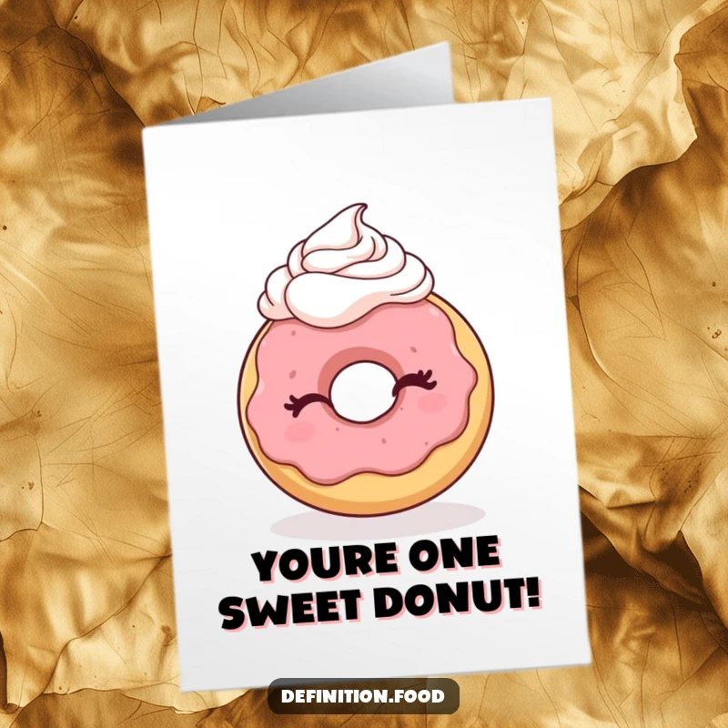 Funny Free Printable donut character winking playfully, ready to deliver birthday wishes with a dollop of whipped cream.