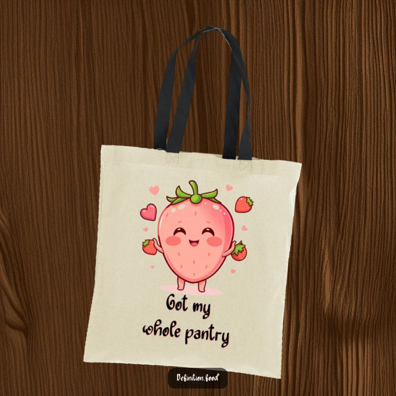 Funny blushing strawberry juggling mini food shapes on a sturdy tote bag, perfect for grocery shopping with a smile.